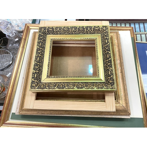 25 - A selection of gilt frames, various sizes plus new photo frame 25 x 19cm etc