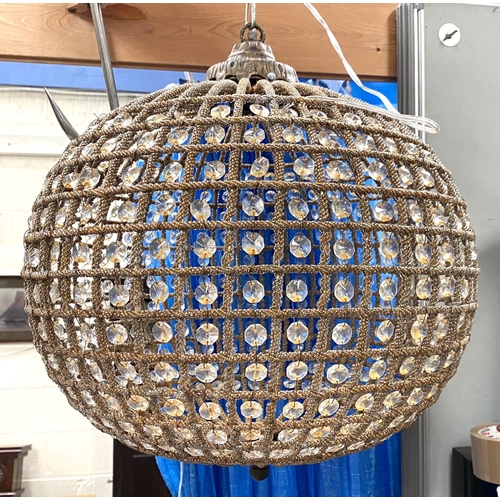 52B - A globe shaped ceiling light fitting aged metal effect with glass pieces between