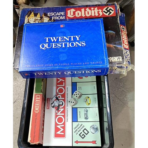 29 - An assortment of vintage and other board games including Scrabble and Monopoly (not guaranteed compl... 