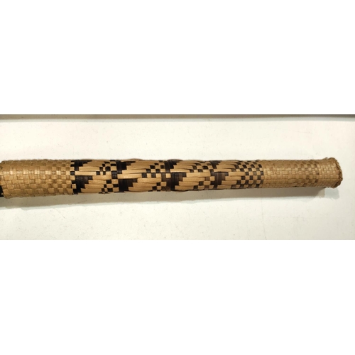 210 - A 20th century Gata style club with split carved head and woven sleeve handle