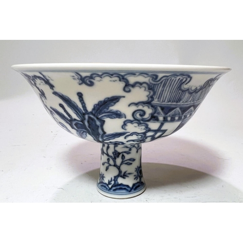 427 - A large Chinese blue and white stem cup with traditional decoration, domestic scene trees plants etc... 