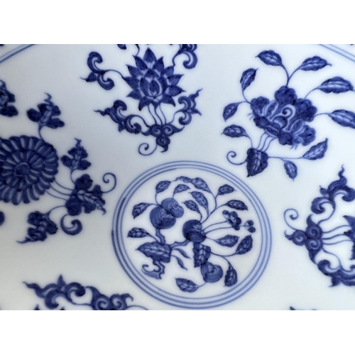 429 - A Chinese blue and white bowl with lobbed rim, floral decoration to the interior a six character mar... 