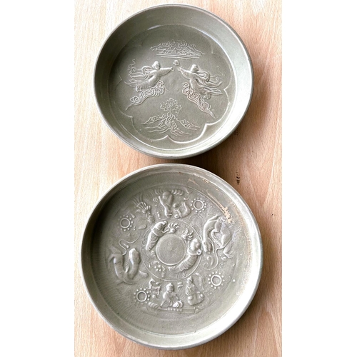 430 - Two Chinese green glazed dishes with relief decorated scenes to base of dishes, diameter 22cm and 20... 