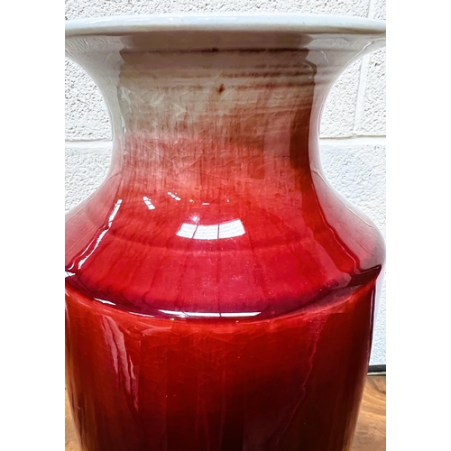 417 - A large Chinese red drip glazed vase, with marks to base, height 38cm