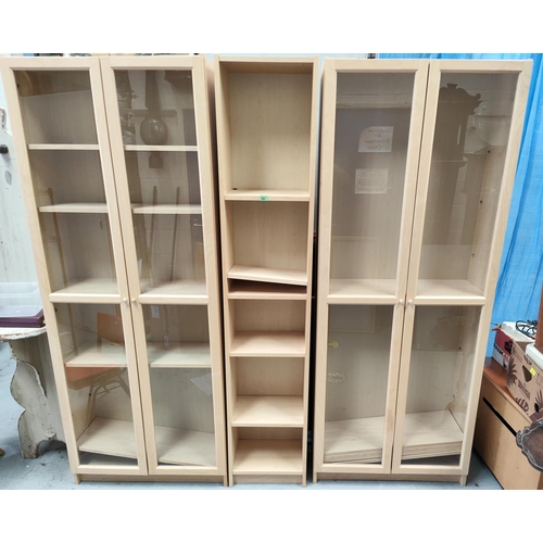 895 - A modern pale wood effect pair of book cases/ display cases with full height glazed doors and a matc... 