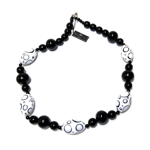 716 - VENICE STYLE, a glass bead necklace in black and white with silver clasp, 64cm; a polished bead neck... 