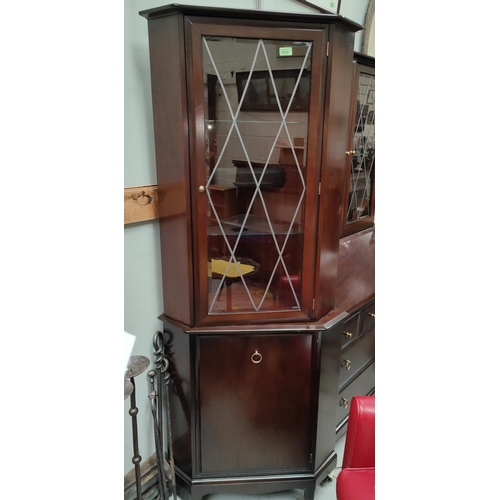 907 - A Stag full height corner cupboard with glazed upper section and cupboard bellow and a Stag glazed s... 