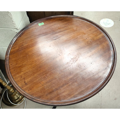 843 - A Georgian Mahogany tilt top tripod occasional table with circular top with raised rim lip, diameter... 