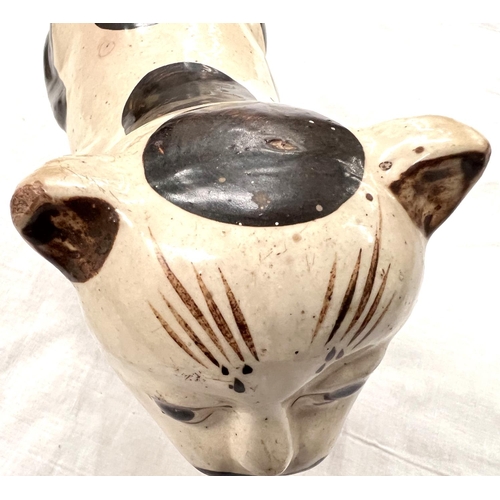 380 - A Chinese ceramic neck rest in the form of a cat length 27cm