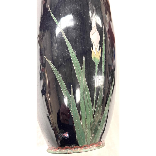 386 - A large cloisonne dark blue ground vase decorated with flowers height 36cm (areas of denting and los... 