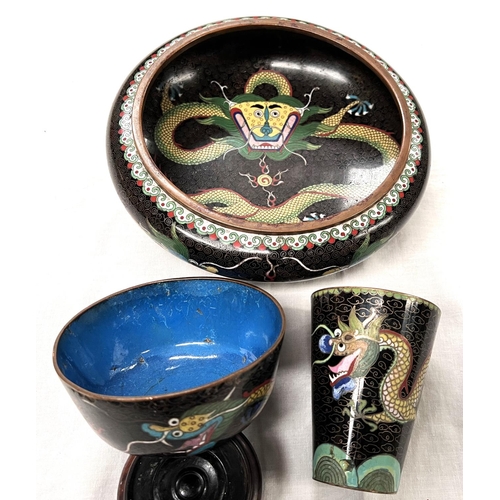 391A - A Chinese cloisonne black ground bowl decorated with dragons and a similar cup