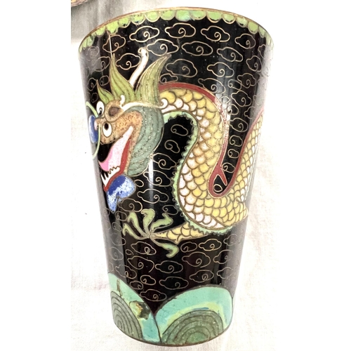 391A - A Chinese cloisonne black ground bowl decorated with dragons and a similar cup