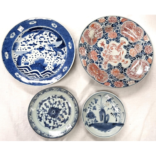 392A - A Chinese blue and white dish an Amari dish and two blue and white smaller dishes