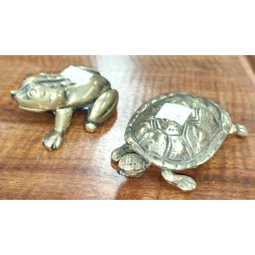 763A - A Victorian brass stamp box in the form of a tortoise and one in the form of a frog