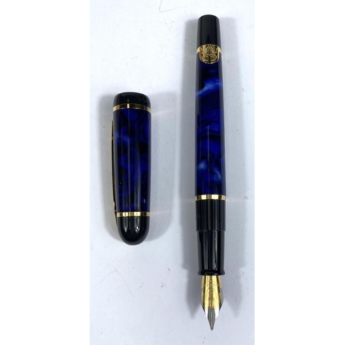 152 - A Watermann Phileas fountain pen, blue marbled effect, cased