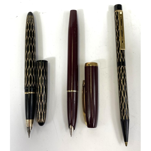 155 - A lady's Schaeffer fountain pen with black and gilt body, a similar ballpoint; another Schaeffer fou... 