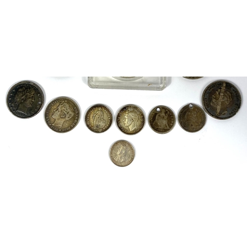 204 - A selection of foreign silver coins including a 1965 Canada dollar