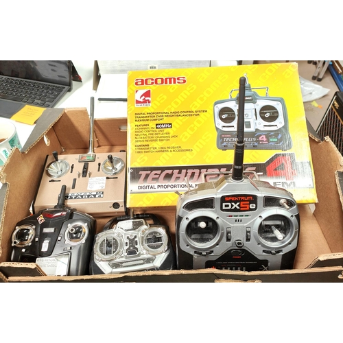 290 - A Spektrum DX6i 6-Channel remote control boxed, a Spektrum DX5e remote control and a selection of ot... 