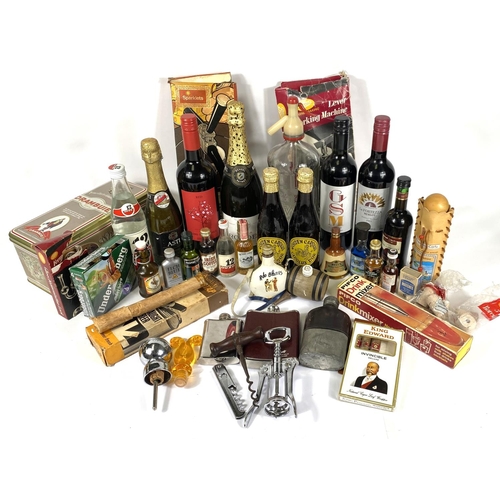 334 - A selection of miniature alcohol, vintage soda syphons and other alcohol related items