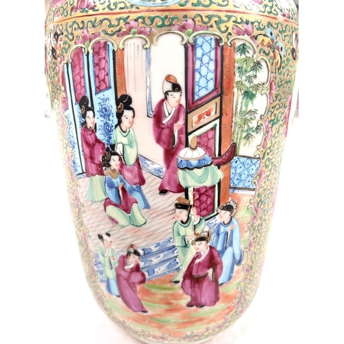 352 - A 19th century Chinese famille rose Rullo vase with polychrome panels depicting traditional scenes o... 