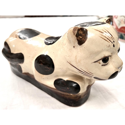 380 - A Chinese ceramic neck rest in the form of a cat length 27cm