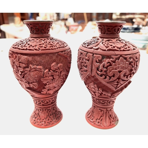 384 - A pair of early 20th century Chinese Cinnabar lacquer vases height 16.5cm  