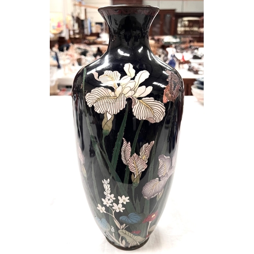 386 - A large cloisonne dark blue ground vase decorated with flowers height 36cm (areas of denting and los... 