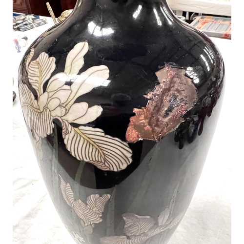 386 - A large cloisonne dark blue ground vase decorated with flowers height 36cm (areas of denting and los... 