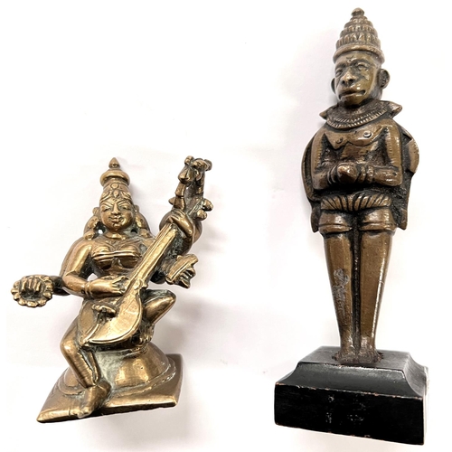 390A - 2 Indian bronze figures 1 multi armed deity the other 2 sided figure on wooden stand height 14cm