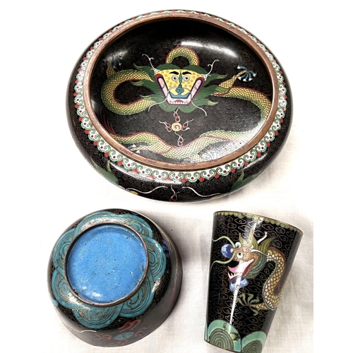 391A - A Chinese cloisonne black ground bowl decorated with dragons and a similar cup