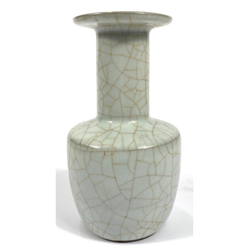 428 - A Chinese pale green crackle glazed vase with flared rim, height 18cm