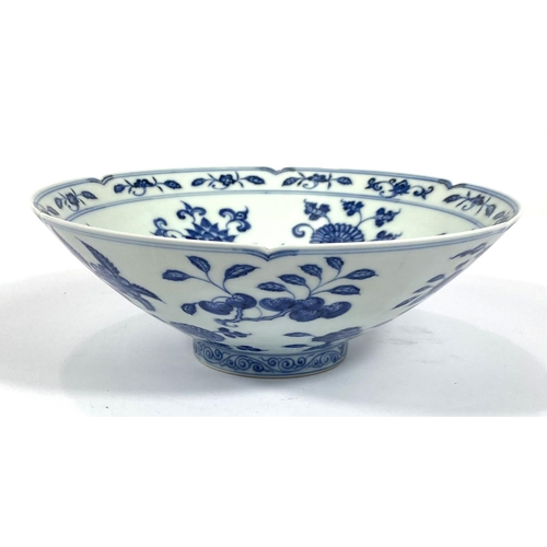 429 - A Chinese blue and white bowl with lobbed rim, floral decoration to the interior a six character mar... 