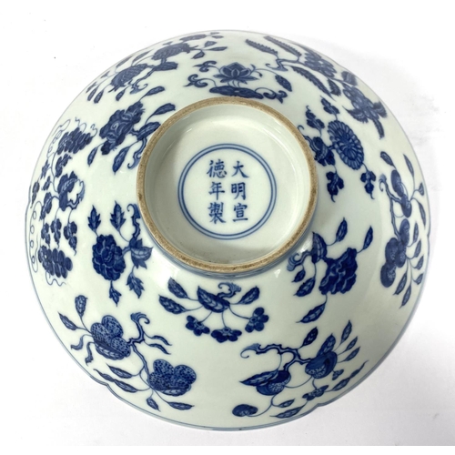 429 - A Chinese blue and white bowl with lobbed rim, floral decoration to the interior a six character mar... 