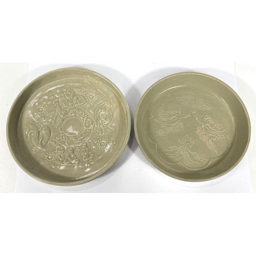 430 - Two Chinese green glazed dishes with relief decorated scenes to base of dishes, diameter 22cm and 20... 