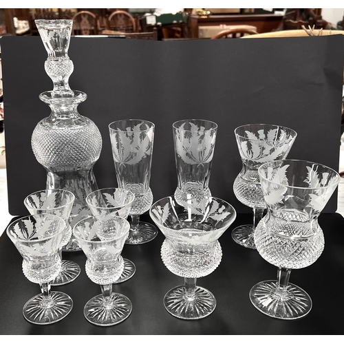 601 - Edinburgh Crystal Thistle Design, a round decanter, 2 champagne flutes, 2 wines (small nick to rim),... 