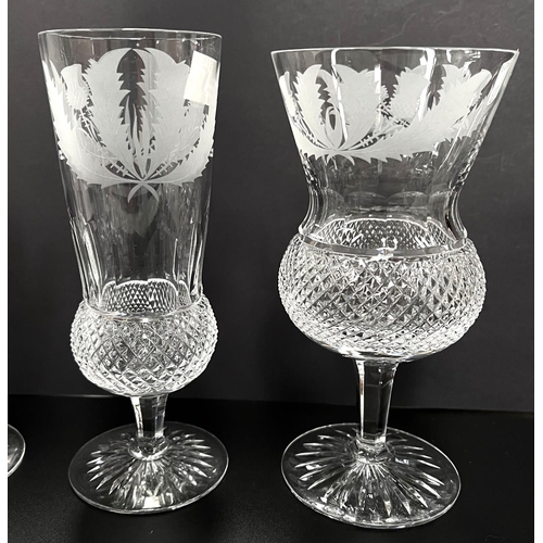 601 - Edinburgh Crystal Thistle Design, a round decanter, 2 champagne flutes, 2 wines (small nick to rim),... 