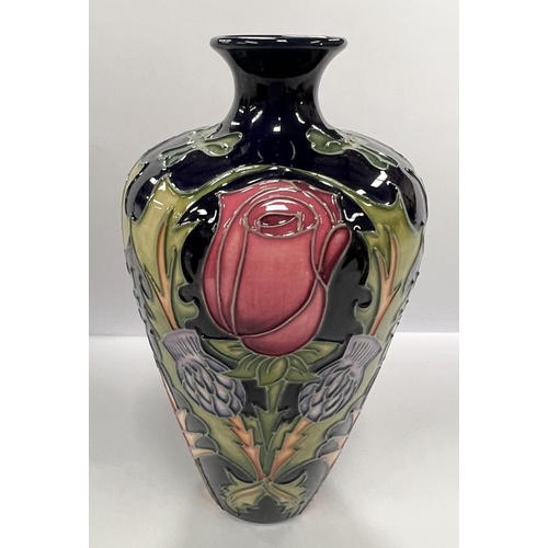 610 - A modern Moorcroft Rose, Thistle, Shamrock and Leek vase designed by Nicola Slaney, height 15.5cm