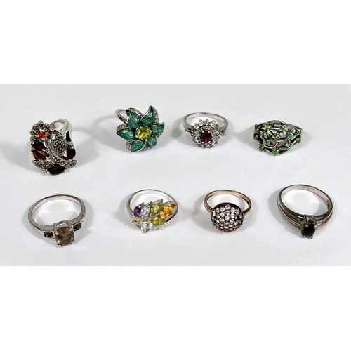 631 - Eight silver rings in a variety of settings and designs, 38.8gm