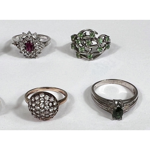 631 - Eight silver rings in a variety of settings and designs, 38.8gm