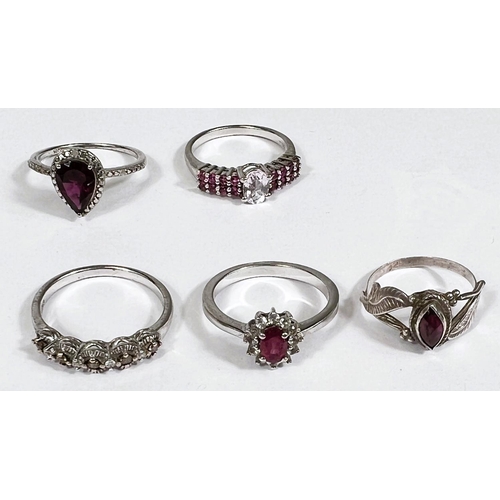 637 - Eight silver rings in a variety of designs, set assorted coloured stones,22.6gm