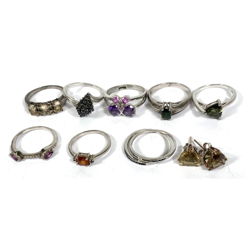 641A - Ten silver rings, stamped '925', assorted designs and set  variety of coloured stones