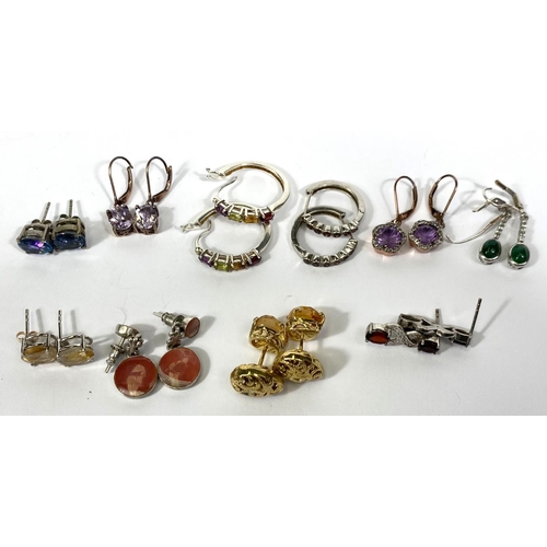 647A - Ten pairs of silver earrings in a variety of styles, set coloured stones