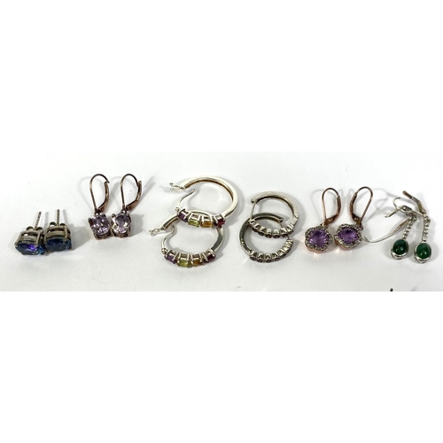 647A - Ten pairs of silver earrings in a variety of styles, set coloured stones