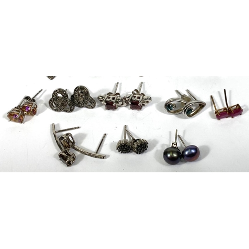 647B - Twelve pairs of silver earrings in a variety of styles, set coloured stonesNo bids sold with next lo... 