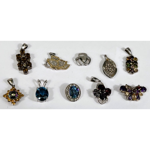 649B - Ten silver pendants set with a variety of coloured stones