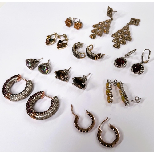 650 - Ten pairs of silver pierced earrings, all set with a variety of coloured stones