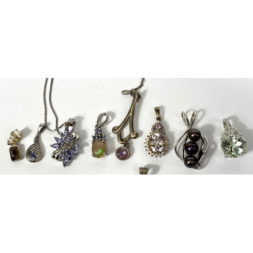 650A - Ten silver pendants set with a variety of coloured stones