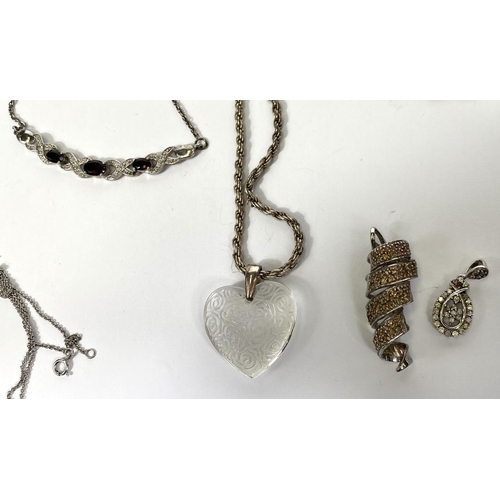 650B - Two silver necklaces with chains; 2 silver pendants; 4 fine silver chains, 37gm approx