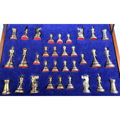 695 - A hallmarked silver and silver gilt Chess Set in a fitted wooded case, Birmingham 1974, Swatkins Gro... 