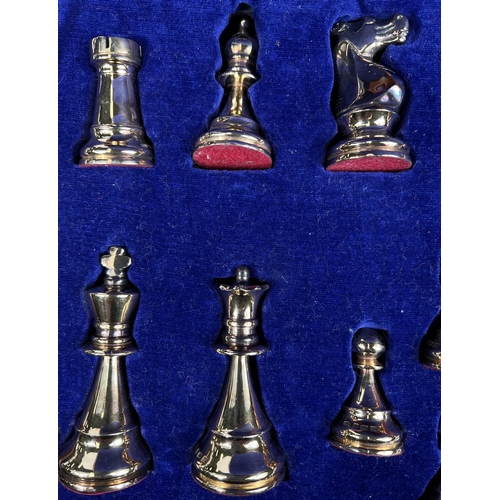 695 - A hallmarked silver and silver gilt Chess Set in a fitted wooded case, Birmingham 1974, Swatkins Gro... 